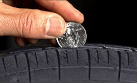 measure tire thickness with coin|how to test tire tread.